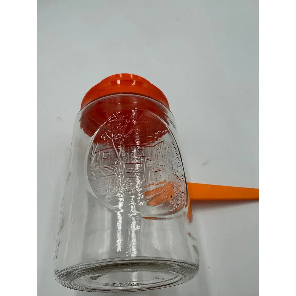 Vintage Anchor Hocking Glass Jar Orange Lid Embossed Log Cabin Scene Canister